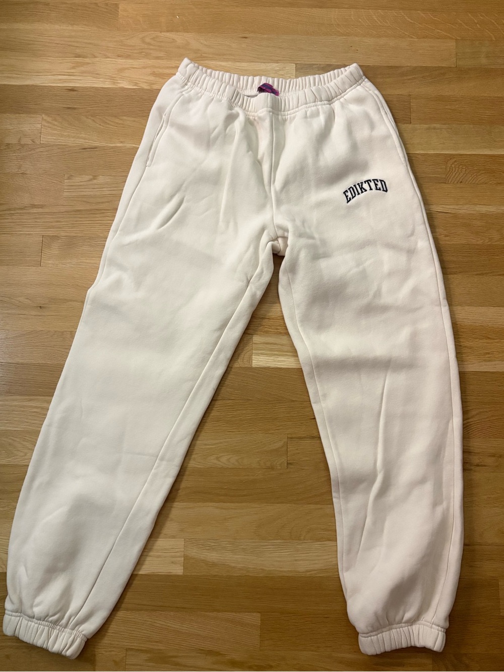 EDIKTED sweatpants jogger bottoms cream with Navy logo size medium